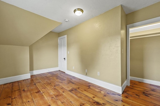 23 Starbird St, Lowell, MA 01854 - bonus room featuring wood-type flooring and baseboards