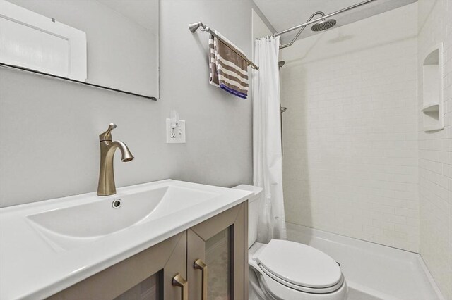 23 Starbird St, Lowell, MA 01854 - full bathroom featuring vanity and tiled shower