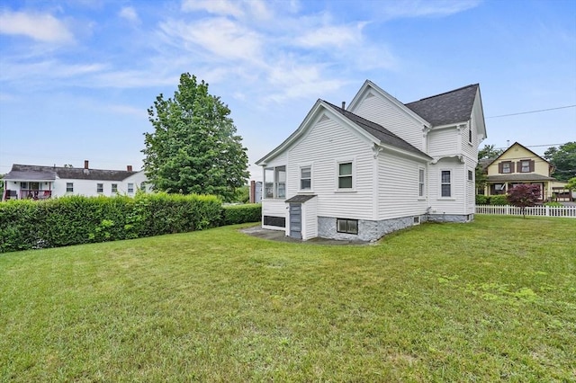 23 Starbird St, Lowell, MA 01854 - rear view of house with roof with shingles