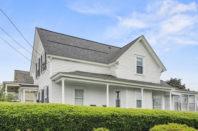 23 Starbird St, Lowell, MA 01854 - view of front of property featuring a shingled roof