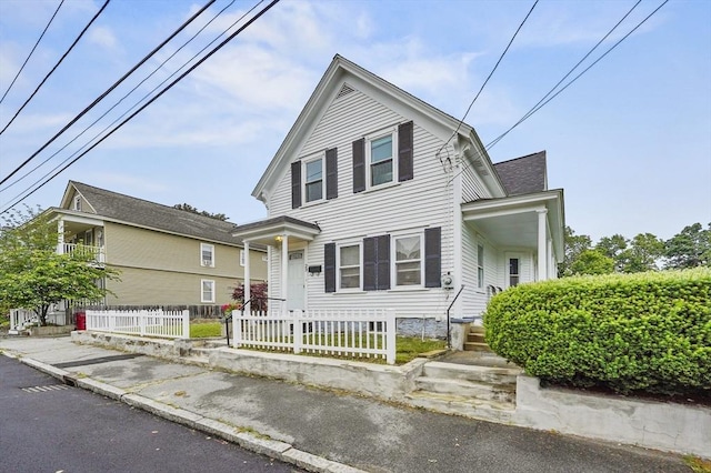 23 Starbird St, Lowell, MA 01854 - view of front of property with a shingled roof