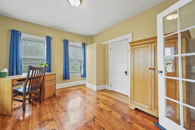23 Starbird St, Lowell, MA 01854 - office space with light wood-style floors and baseboards