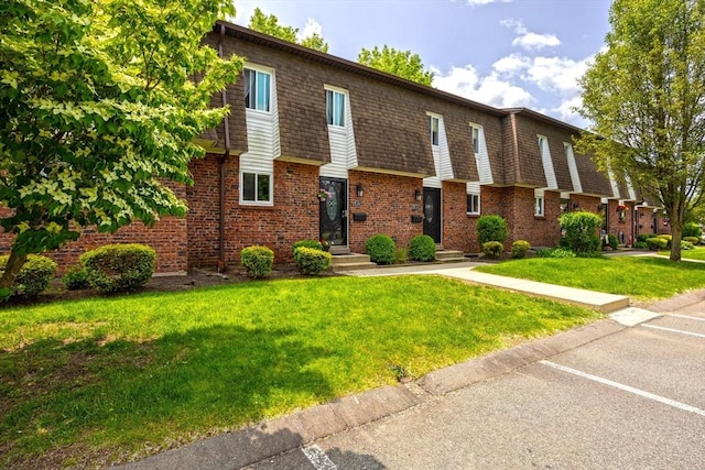 14 Hillcrest Park Unit 14, South Hadley, MA 01075 - multi unit property with uncovered parking, a front yard, brick siding, and mansard roof