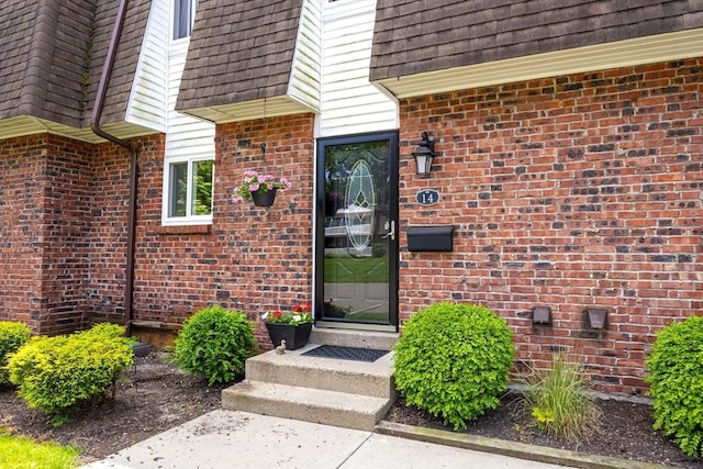 14 Hillcrest Park Unit 14, South Hadley, MA 01075 - doorway to property with mansard roof and brick siding