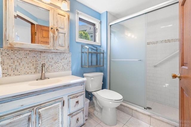 91 Bartholomew St, Peabody, MA 01960 - bathroom with vanity, a stall shower, tasteful backsplash, and tile patterned floors