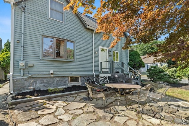91 Bartholomew St, Peabody, MA 01960 - rear view of property featuring a patio