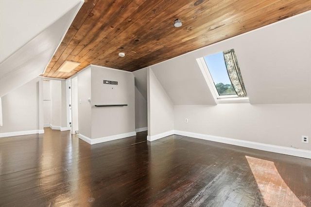 91 Bartholomew St, Peabody, MA 01960 - additional living space with dark wood finished floors, a skylight, vaulted ceiling, and wood ceiling