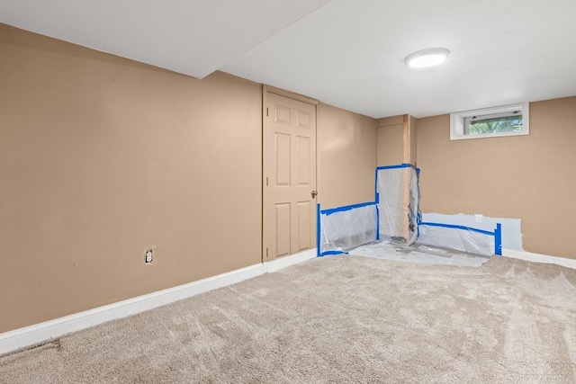 91 Bartholomew St, Peabody, MA 01960 - below grade area featuring carpet floors and baseboards