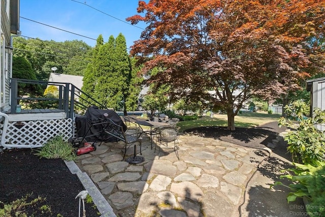 91 Bartholomew St, Peabody, MA 01960 - view of patio featuring outdoor dining space