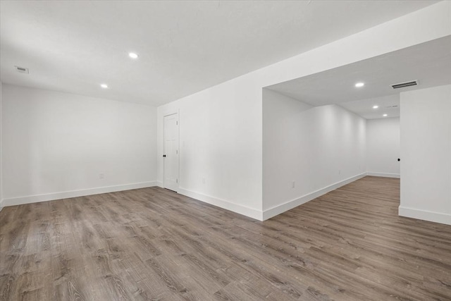 740A Burncoat St, Worcester, MA 01606 - below grade area with recessed lighting, wood finished floors, and baseboards