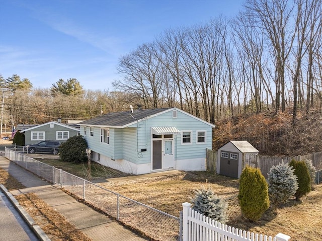 view of front of property featuring a storage unit