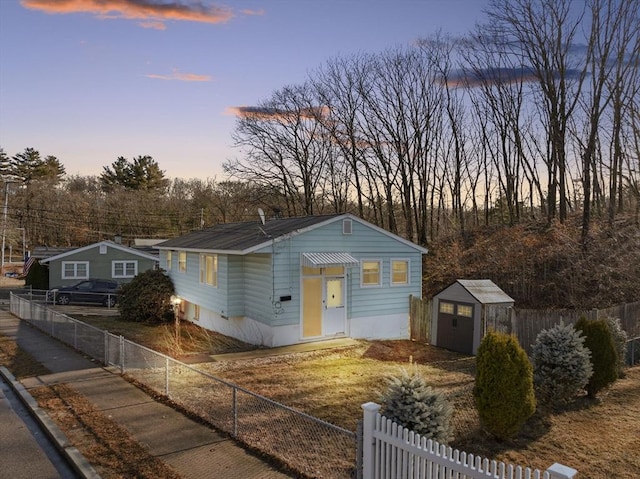 view of front facade featuring a shed