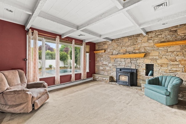 living room featuring baseboard heating, carpet flooring, beamed ceiling, coffered ceiling, and a wood stove