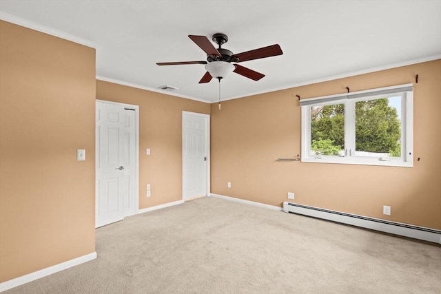 unfurnished bedroom with baseboards, carpet flooring, ornamental molding, a baseboard radiator, and ceiling fan