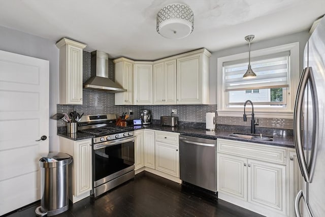 1792 Washington St, Braintree, MA 02184 - kitchen featuring stainless steel appliances, wall chimney exhaust hood, tasteful backsplash, and cream cabinets