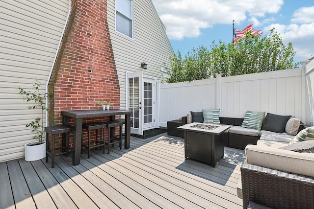 1792 Washington St, Braintree, MA 02184 - deck featuring an outdoor living space with a fire pit and french doors
