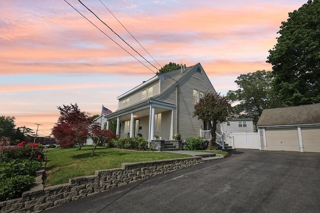 1792 Washington St, Braintree, MA 02184 - view of front of property featuring an outdoor structure and a detached garage