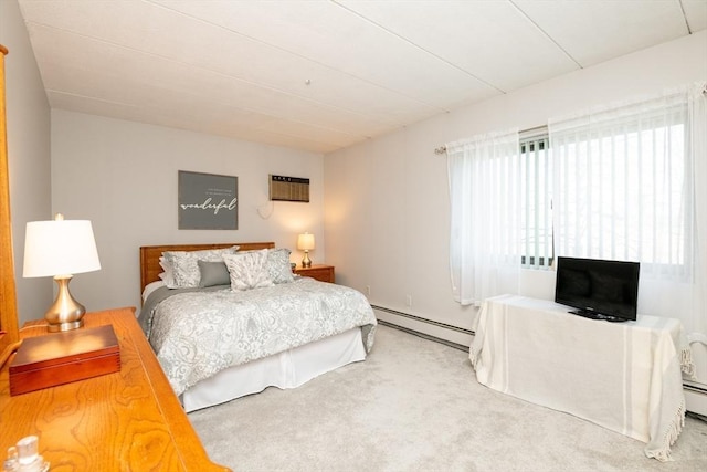 bedroom featuring a baseboard radiator, carpet floors, and an AC wall unit