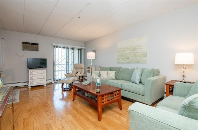 living area with a wall unit AC, light wood finished floors, and a baseboard radiator