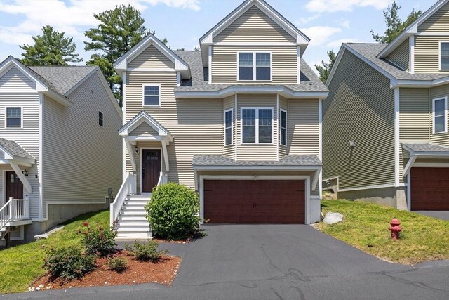 6 Comanche Ter Unit 6, Westford, MA 01886 - traditional-style house featuring an attached garage, driveway, and a shingled roof