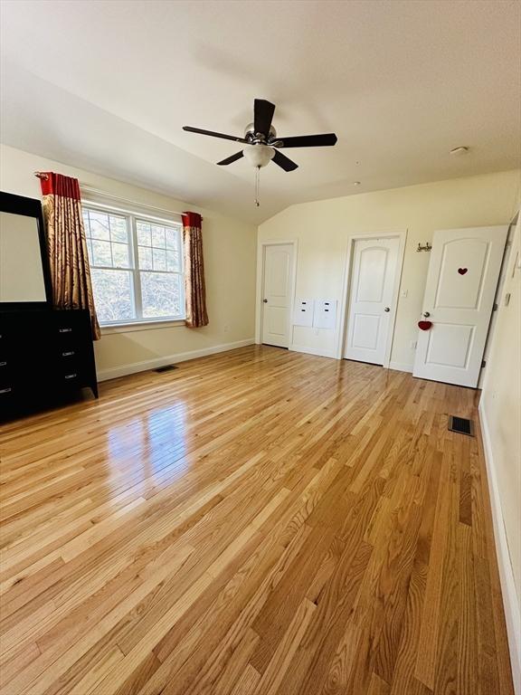6 Comanche Ter Unit 6, Westford, MA 01886 - unfurnished bedroom with light wood-style floors and ceiling fan