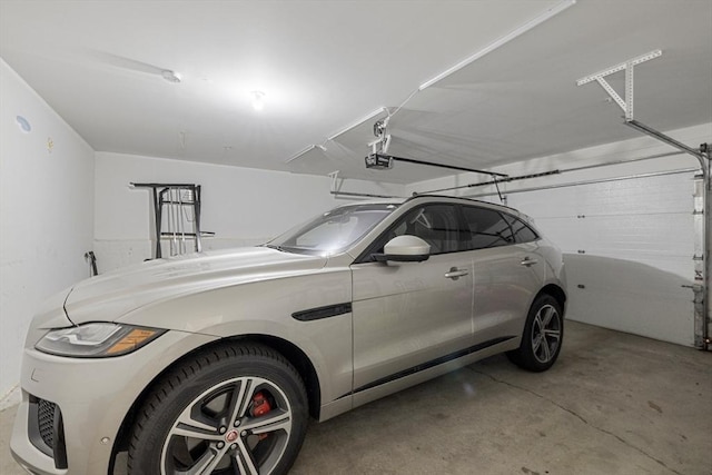 6 Comanche Ter Unit 6, Westford, MA 01886 - garage featuring a garage door opener