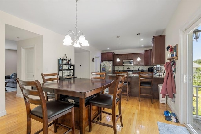 6 Comanche Ter Unit 6, Westford, MA 01886 - dining area featuring light wood-style floors, a chandelier, and recessed lighting