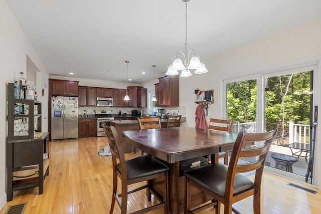 6 Comanche Ter Unit 6, Westford, MA 01886 - dining room featuring a chandelier, light wood-type flooring, and recessed lighting