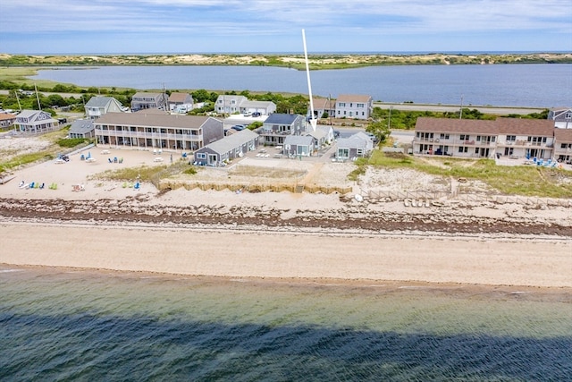 bird's eye view featuring a beach view and a water view