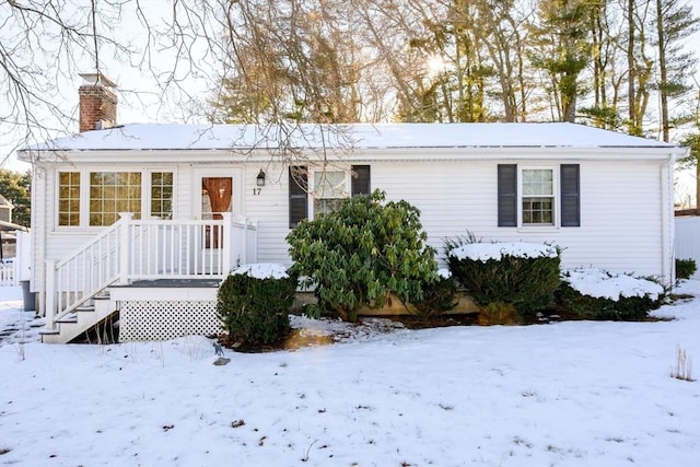 view of snow covered house