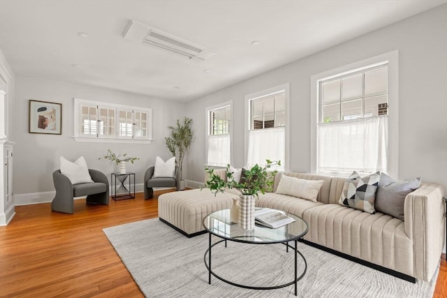 301 Pond St, Boston, MA 02130 - living area featuring light wood-type flooring and baseboards