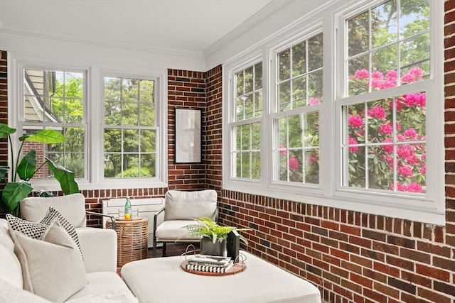 301 Pond St, Boston, MA 02130 - sunroom with healthy amount of natural light, brick wall, and crown molding
