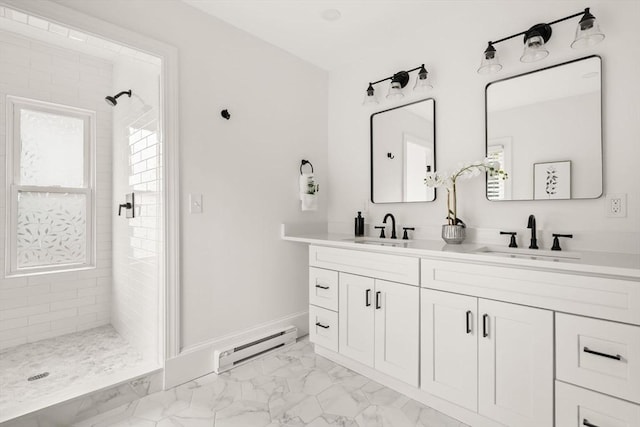 301 Pond St, Boston, MA 02130 - bathroom with baseboard heating, double vanity, a shower stall, marble look tile flooring, and plenty of natural light