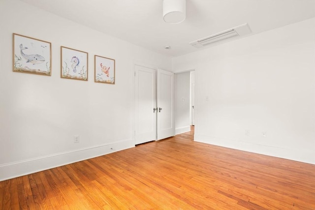 301 Pond St, Boston, MA 02130 - spare room featuring light wood finished floors and baseboards