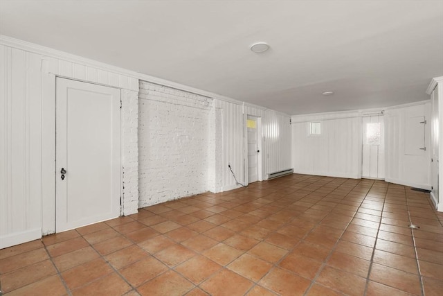 301 Pond St, Boston, MA 02130 - unfurnished living room featuring a baseboard radiator, light tile patterned floors, and crown molding