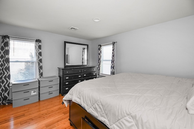 bedroom featuring light hardwood / wood-style floors