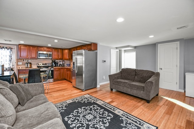 living room featuring light wood-type flooring