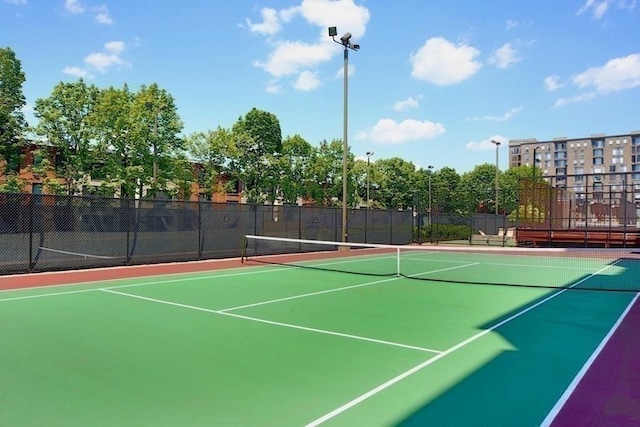 33 Pond Ave Unit Ph1207, Brookline, MA 02445 - view of tennis court with community basketball court and fence