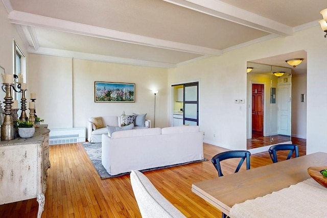 33 Pond Ave Unit Ph1207, Brookline, MA 02445 - living area with beamed ceiling and light wood-style flooring