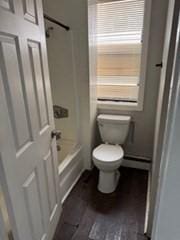 620 Dudley St, Boston, MA 02125 - bathroom with toilet and washtub / shower combination