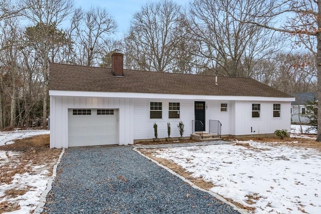 single story home featuring a garage