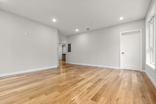 267 Old Colony Unit 205, Boston, MA 02127 - unfurnished living room with recessed lighting, light wood-type flooring, electric panel, and baseboards