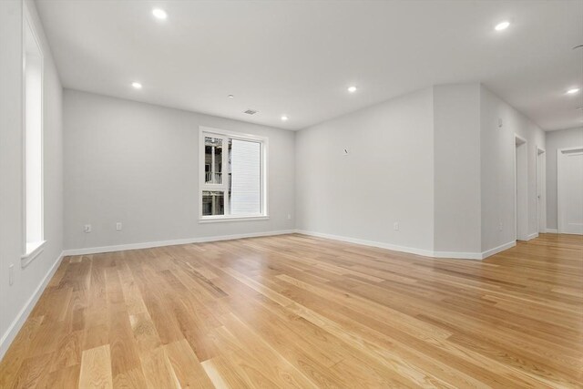 267 Old Colony Unit 205, Boston, MA 02127 - spare room featuring recessed lighting, plenty of natural light, light wood-style flooring, and baseboards