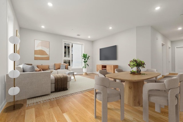 267 Old Colony Unit 205, Boston, MA 02127 - living area featuring visible vents, baseboards, light wood finished floors, and recessed lighting