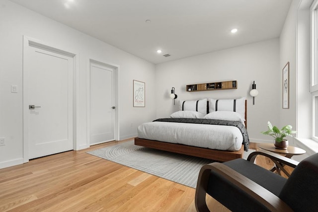 267 Old Colony Unit 205, Boston, MA 02127 - bedroom featuring light wood-style flooring, recessed lighting, and baseboards