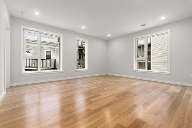 267 Old Colony Unit 205, Boston, MA 02127 - unfurnished room with light wood-type flooring, recessed lighting, visible vents, and a wealth of natural light