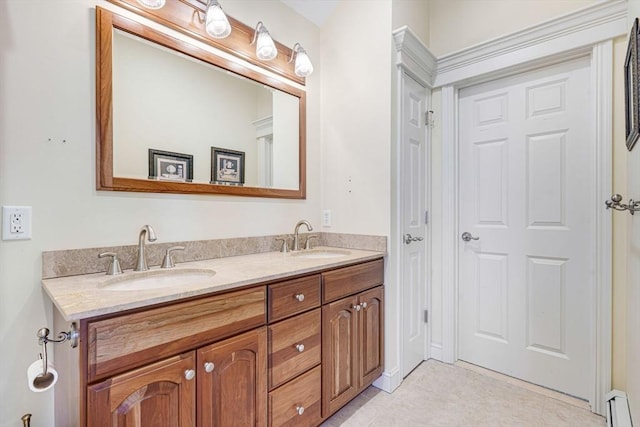 bathroom featuring vanity, tile patterned flooring, and a baseboard heating unit