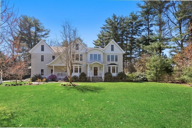 view of front of home featuring a front yard