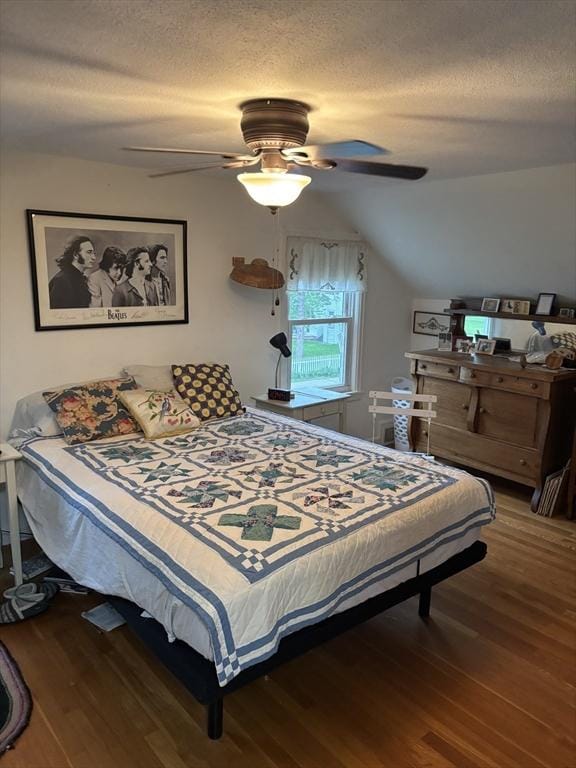 14 Anderson Ave, Holyoke, MA 01040 - bedroom with wood finished floors, a textured ceiling, vaulted ceiling, and a ceiling fan