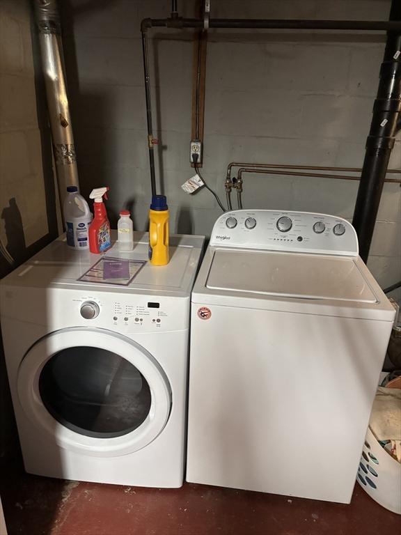 14 Anderson Ave, Holyoke, MA 01040 - washroom with washer and clothes dryer and concrete block wall